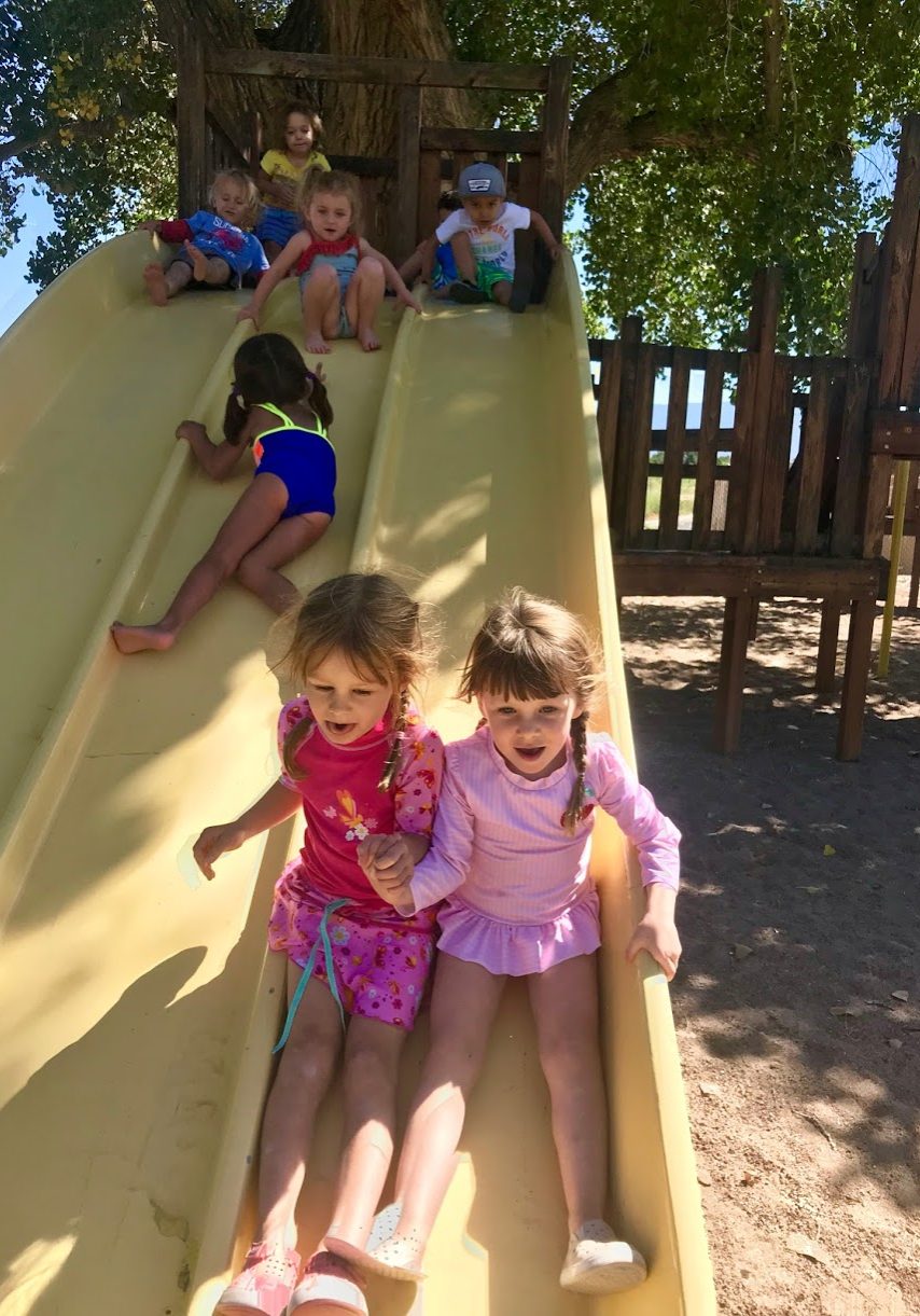 Children at SOTV Preschool on the slide